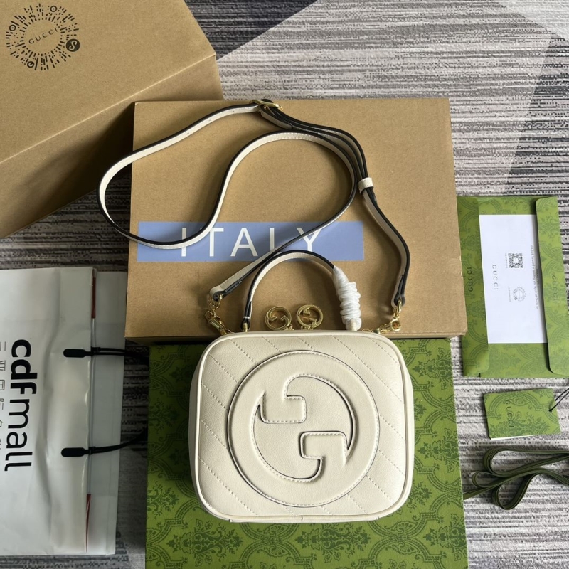 G*u*i top handle bags